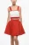 Gebreide crop top met logoknopen in Bianco, Rosso