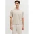 JJ REBEL relaxed polo fijn gebreid beige