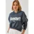 Gebreid oversized crop sweatshirt met capuchon en pompon