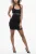 Mini-jurk met halternek en open rugdetail in zwart