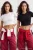 TRENDYOLMİLLA Dames Zwart Effen 2-pack Kort Getailleerd Blouses