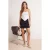 TRENDYOLMİLLA Dames Zwart Effen Extra Kort / Super Mini Rokken