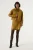 Okergele leather look rok