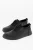 Effen leren en rubberen lage sneakers in zwart