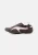 PUMA Sneakers laag ‘Mostro Move Venus’  chocoladebruin / wit