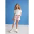 Kort T-shirt met ribstructuur en ronde hals