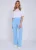 Hemelsblauwe broek met elastische taille en uitlopende pijpen