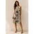 Abstracte swingjurk met sleutelgatprint