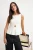 TRENDYOLMİLLA Dames Ecru Gestreept Mouwloos Peplum Blouses