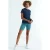 Dames relaxte T-shirt met ronde hals en zijsplitten