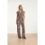 Smashed Lemon Stijlvolle stretch jumpsuit met palmprint in bruin en beige |
