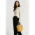 Coccinelle Leather Bucket Bag In Mustard Yellow