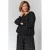 Gozzip Plus Size blouse met smockwerk – zwart/wit