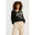 Smashed Lemon Zwart en offwhite bloemenprint met v-hals gebreide top |