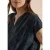 Blouse met hangende schouder en borduursel