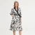 Bi-material wrap jurk met tropische print