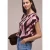 Blouse met overhangende schouders en getapete details