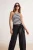 TRENDYOLMİLLA Dames Ecru Gestreept Mouwloos Getailleerd Blouses