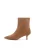 Light brown suede boots on a low stiletto heel