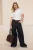 TRENDYOLMİLLA Dames Ecru Effen Kort Regular fit Blouses