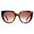 Prada PR14WS 01R0A6 caramel tortoise en poederbruin gradiënt zonnebril
