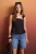 TRENDYOLMİLLA Dames Zwart Effen Mouwloos Peplum Blouses