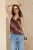 Mouwloze getailleerde blouse met sjaalpatroon voor dames
